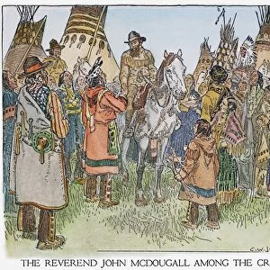 CANADA: MISSIONARY, 1870s. Methodist missionary John McDougall among the Cree Native