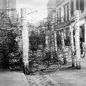 CHINA: SHANGHAI, 1927. Barbed wire blockade on a street in Shanghai, China. Photograph