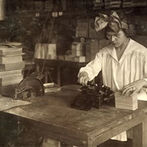 HINE: BOSTON INDEX CARD CO. A girl stamping labels at the Boston Index Card Co
