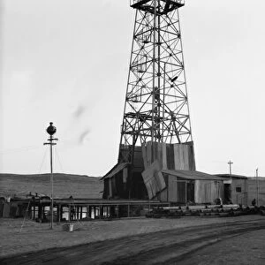 IRAQ: OIL FIELDS, 1932. Drilling tower, probably of the Iraq Petroleum Company near Kirkuk, Iraq