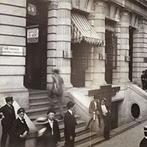 STOCK BROKERS, c1902. Crowd of men involved in curb exchange trading on Broad Street