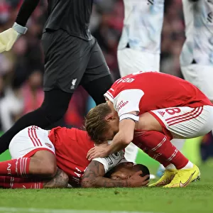 Arsenal's Martin Odegaard Comforts Injured Gabriel Jesus during Arsenal vs Liverpool (2022-23)