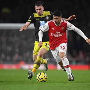 Arsenal's Martinelli Outmaneuvers Southampton's Hojbjerg in Premier League Clash