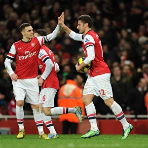 Olivier Giroud celebrates scoring his 2nd goal for Arsenal with Thomas Vermaelen