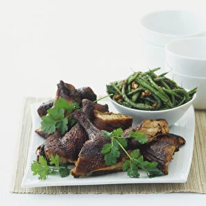 Braised duck served with green beans