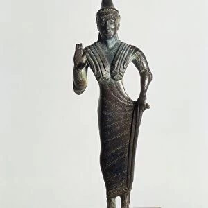 Italy, Perugia, Bronze statue depicting female figure making offering