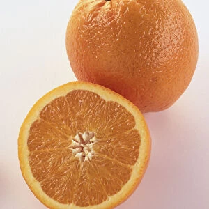 Oranges, one whole orange, half an orange