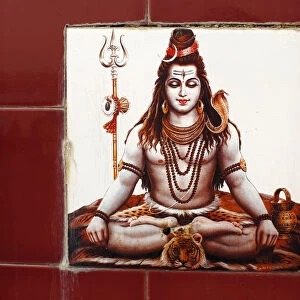 Shiva ceramic tile on a bathing ghat in Rishikesh