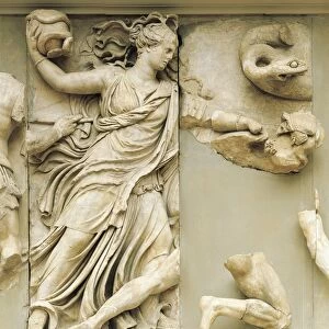 Turkey, Bergama, Detail of the frieze from Pergamon altar representing a goddess throwing a vase with a snake against a giant