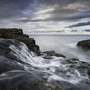Dunseverick Falls along the famous Causeway Coast in Northern Ireland
