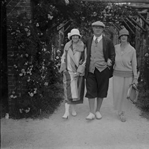 A celebrity at Le Touquet. Mr P G Wodehouse, the well known author, photographed with his wife