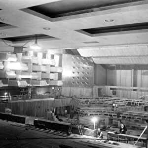 An interior view of the nearly completed Festival of Britain Concert Hall, showing