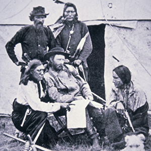 General George A. Custer (1839-76) with his Indian scouts during the Yellowstone