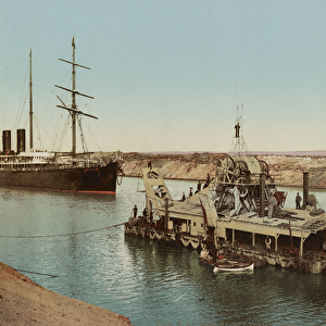Suez Canal, ship and dredging machine, c. 1900 (colour photochrom)