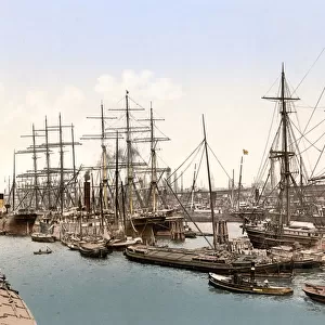 Tall ships and barges docking at Hamburg, pub. c. 1895 (postcard chromolithograph)