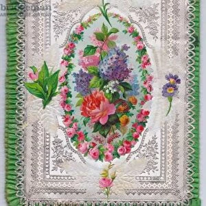 A Victorian decoupage embosed paper lace greeting card with a pleated silk border of a