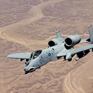 An A-10 Thunderbolt soars above the skies of Iraq