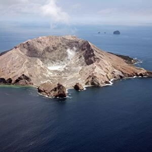 Aerial view of White Island volcano with central acidic crater lake, Bay of Plenty