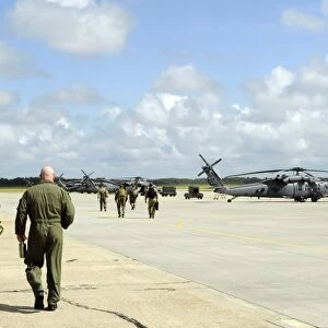 Aircrews prepare to depart to provide search and rescue support