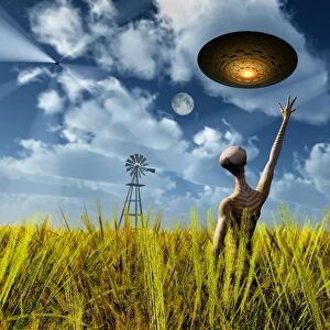An alien being directing its spacecraft to make crop circles
