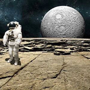 An astronaut on a barren planet with moon rising over the horizon