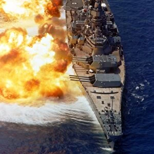 Battleship USS Iowa firing its Mark 7 16-inch / 50-caliber guns