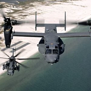 A CV-22 Osprey and an MH-53 Pave Low fly over the coastline of Florida