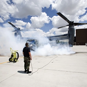 A CV-22 Osprey starts its engines at Kirtland Air Force Base