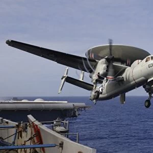 An E-2C Hawkeye launches from USS Kitty Hawk
