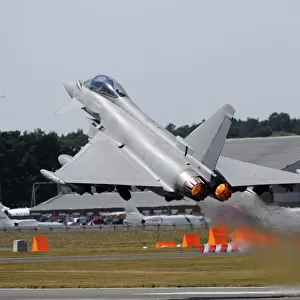 Eurofighter EF2000 Typhoon from the Royal Air Force at full afterburner during takeoff
