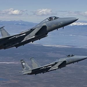 Two F-15 Eagles conduct air-to-air training over Oregon