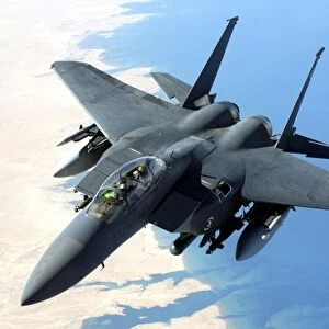 An F-15E Strike Eagle flies over Iraq during a combat mission