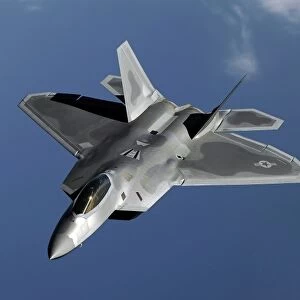 A F-22 Raptor returns to a mission after refueling