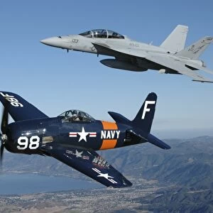 F / A-18 Hornet and F8F Bearcat flying over Chino, California