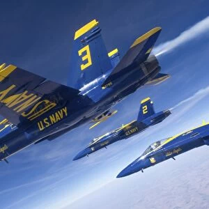 F / A-18 Hornets of the Blue Angels fly in formation over Colorado