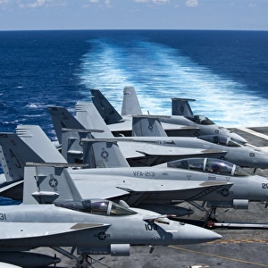 F / A-18 Super Hornets on the flight deck of USS George H. W. Bush
