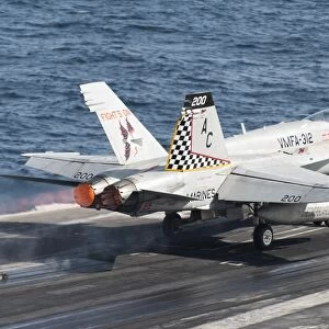 An F / A-18C Hornet launches from USS Harry S. Truman