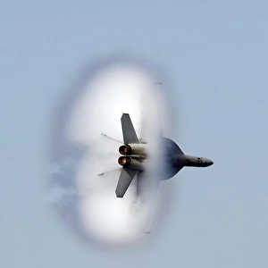 An F / A-18F Super Hornet completes a super-sonic flyby