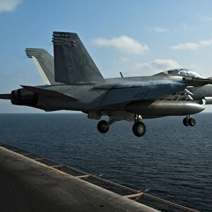 An F / A-18F Super Hornet launches from USS John C. Stennis