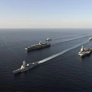 Fleet of Navy ships transit the Arabian Sea