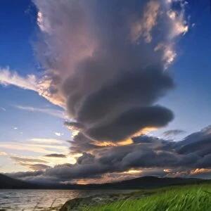 A giant stacked lenticular cloud over Tjeldsundet, Troms County, Norway