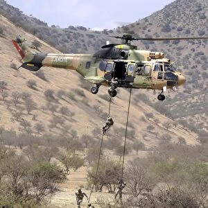 hilean Special Forces perform an Air Assault demonstration at their training area in Colina