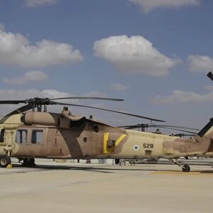 A line of UH-60L Yanshuf helicopters at Hatzerim Air Force Base