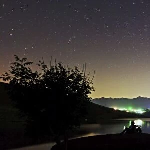 Lunar eclipse and Milky Way above Taleqan Lake, Iran