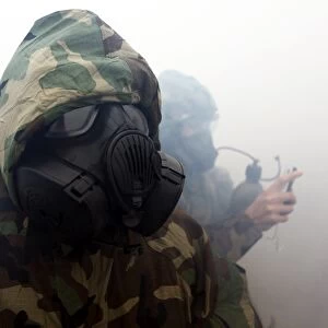 A Marine wearing a gas mask during during chemical warfare training
