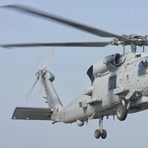 An MH-60R Seahawk in flight over the Persian Gulf