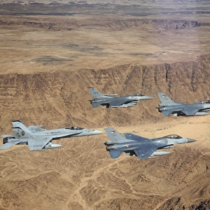 Military planes flying over the Wadi Rum desert in Jordan
