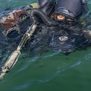 A Navy SEAL combat swimmer