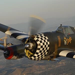 P-47 Thunderbolt flying over Chino, California