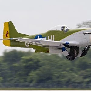 A P-51 Mustang takes off from Mount Comfort, Indiana